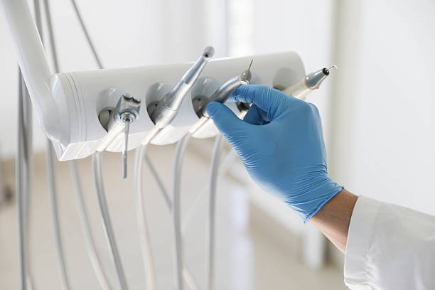 Professional Tooth Extraction technician working in West Monroe, LA